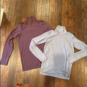 2 athleta T necks….never worn large
